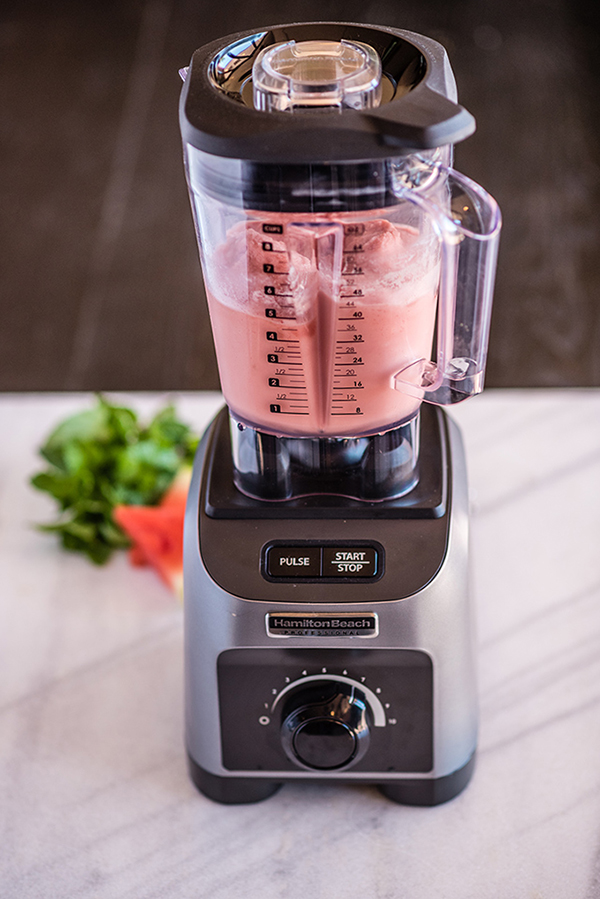 blender with a mixed watermelon sorbet