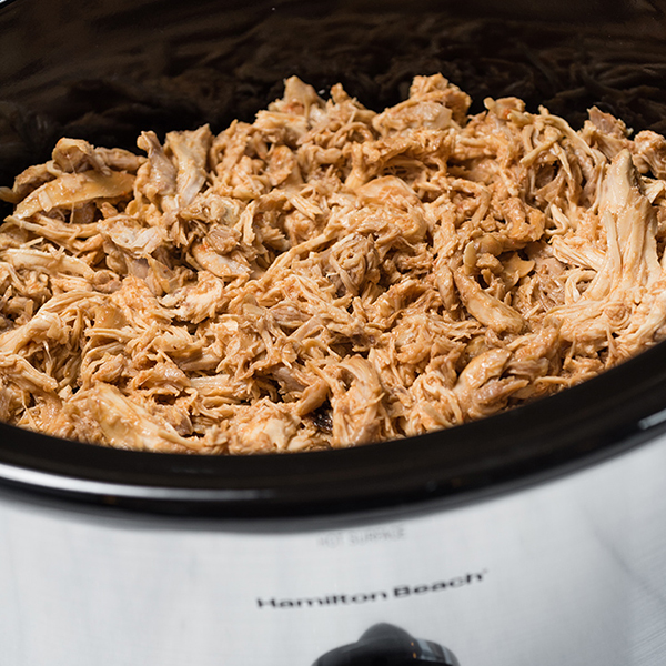 shredded chicken in a slow cooker