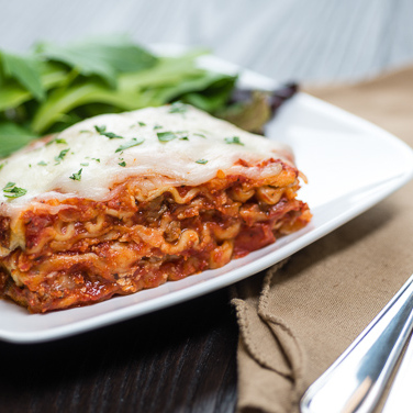 slow cooker lasagna on a white plate